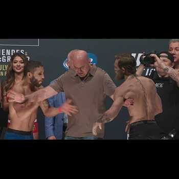 Conor McGregor and Chad Mendes weigh in for UFC 189